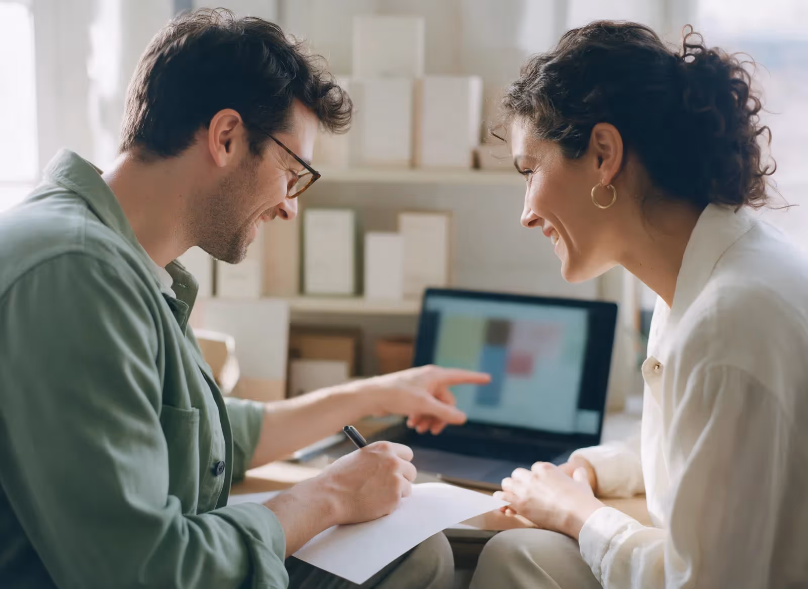 Two Ownlet team members reviewing an application together
